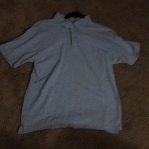 I’m selling a light blue school shirt.